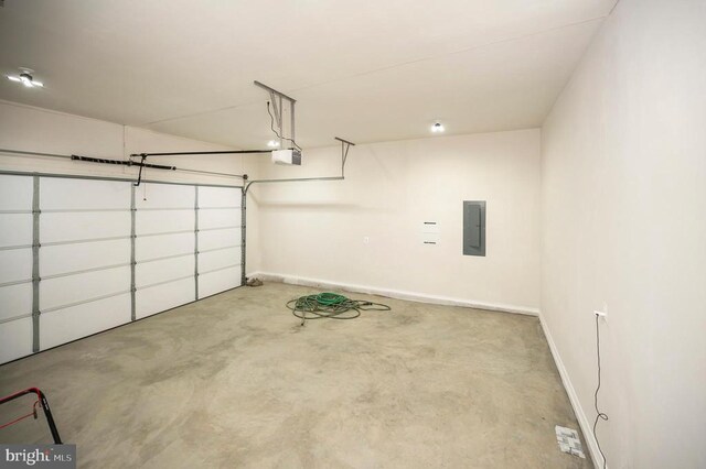 400 Constitution Blvd, Locust Grove, VA 22508 - garage with electric panel, a garage door opener, and baseboards
