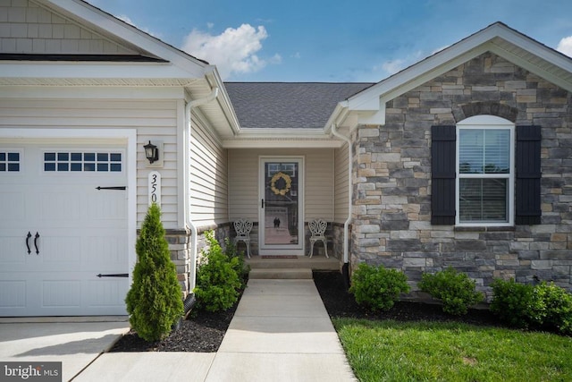 35079 Orchid Ln, Locust Grove, VA 22508 - property entrance with stone siding, an attached garage, and roof with shingles