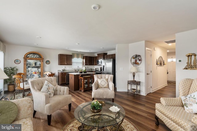 35079 Orchid Ln, Locust Grove, VA 22508 - living area featuring dark wood-type flooring, recessed lighting, and baseboards