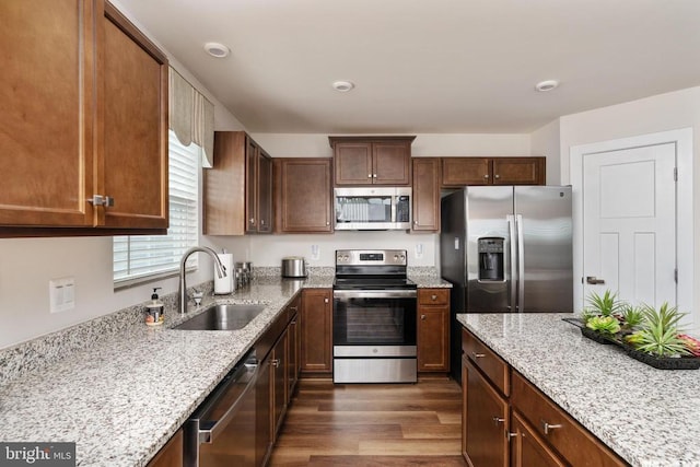 35079 Orchid Ln, Locust Grove, VA 22508 - kitchen with stainless steel appliances, a sink, dark wood-style floors, and light stone countertops