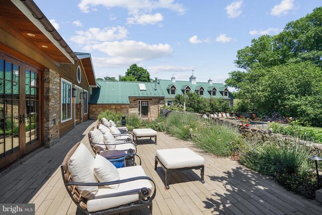 wooden deck with outdoor lounge area