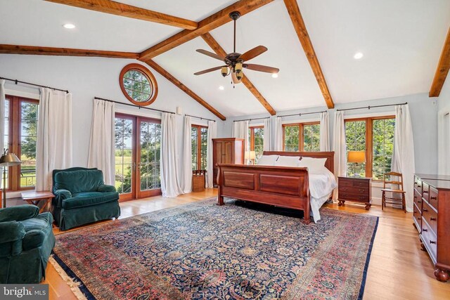 bedroom with multiple windows, light wood-type flooring, recessed lighting, and access to exterior