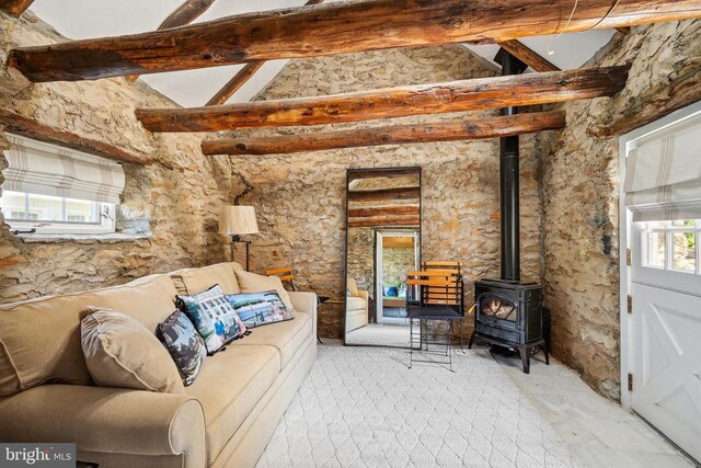 living room with a wood stove