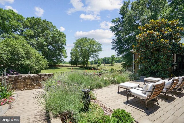 view of home's community featuring a patio