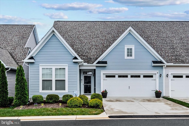 6607 Golden Pheasant Run, Fredericksburg, VA 22407 - traditional-style home featuring concrete driveway, an attached garage, and roof with shingles