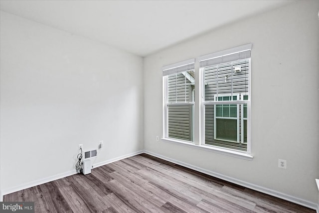 6607 Golden Pheasant Run, Fredericksburg, VA 22407 - spare room with wood finished floors and baseboards