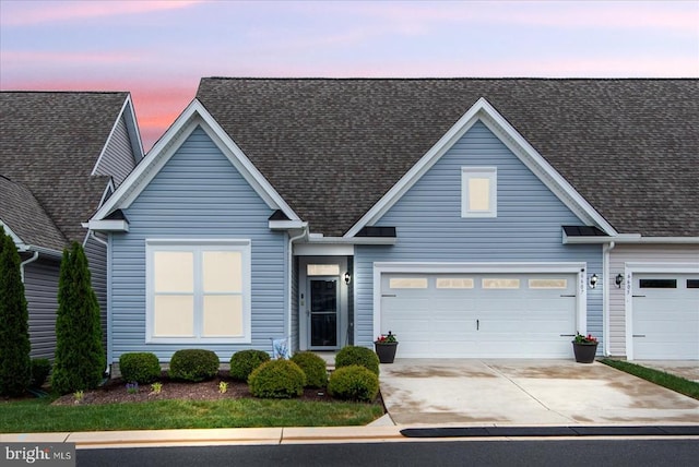6607 Golden Pheasant Run, Fredericksburg, VA 22407 - traditional-style house with concrete driveway, a garage, and roof with shingles