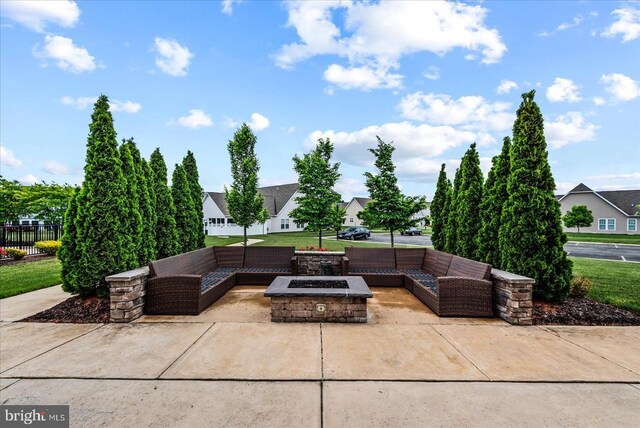 6607 Golden Pheasant Run, Fredericksburg, VA 22407 - view of patio / terrace with an outdoor living space with a fire pit and a residential view