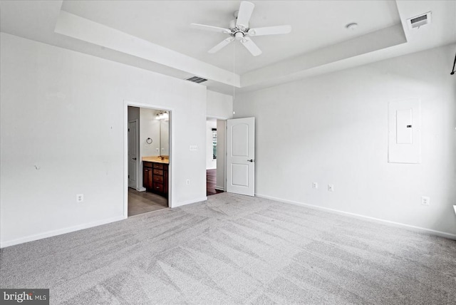 6607 Golden Pheasant Run, Fredericksburg, VA 22407 - unfurnished bedroom featuring a tray ceiling, carpet flooring, baseboards, and ensuite bathroom