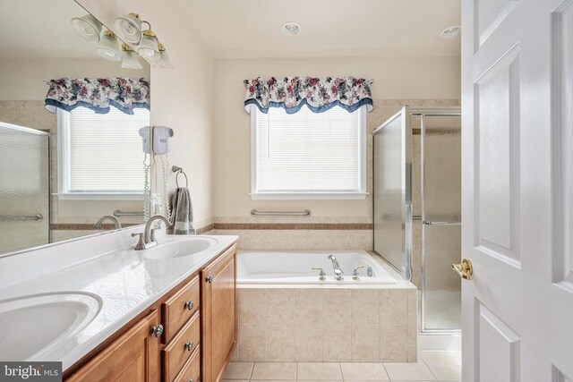 10205 Iverson Ave, Fredericksburg, VA 22407 - full bathroom featuring tile patterned flooring, a stall shower, a bath, and double vanity