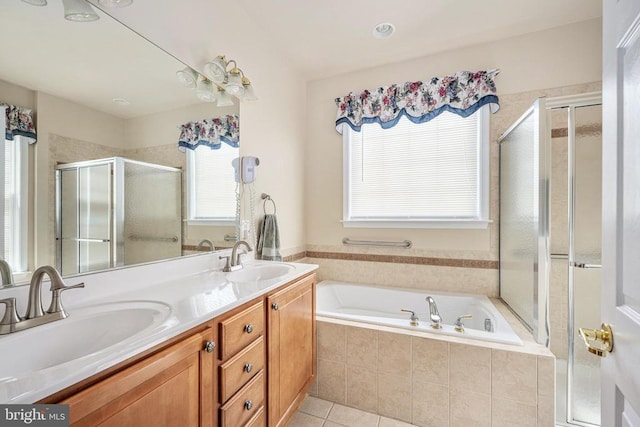 10205 Iverson Ave, Fredericksburg, VA 22407 - bathroom featuring plenty of natural light, a stall shower, and a garden tub