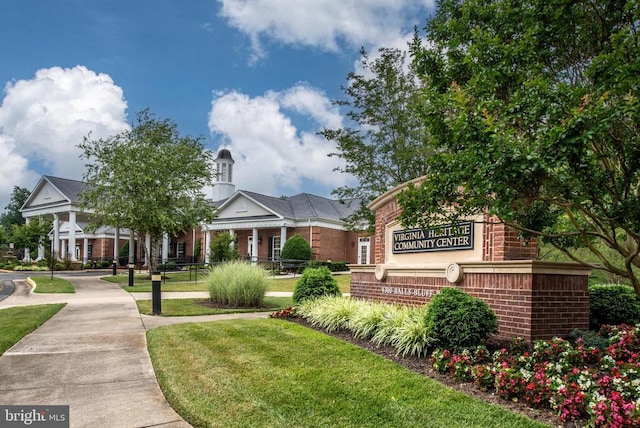 10205 Iverson Ave, Fredericksburg, VA 22407 - view of front of home featuring brick siding and a front yard