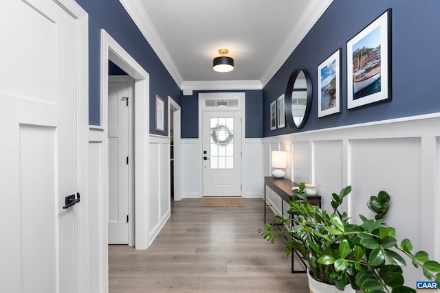 760 Arboleda Dr, Crozet, VA 22932 - entrance foyer with a decorative wall, crown molding, a wainscoted wall, and wood finished floors