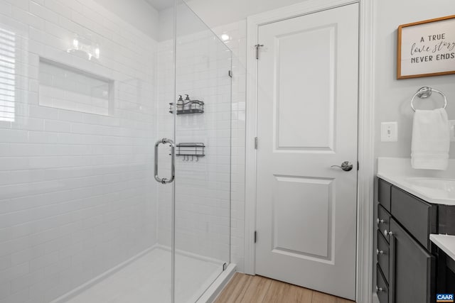 1261 Old Trail Dr, Crozet, VA 22932 - full bath featuring vanity, a stall shower, and wood finished floors