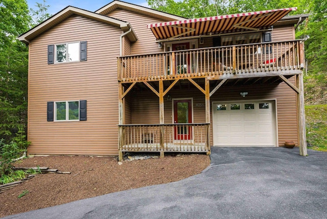 4056 Palmer Rd, Mcgaheysville, VA 22840 - view of front facade featuring an attached garage and asphalt driveway
