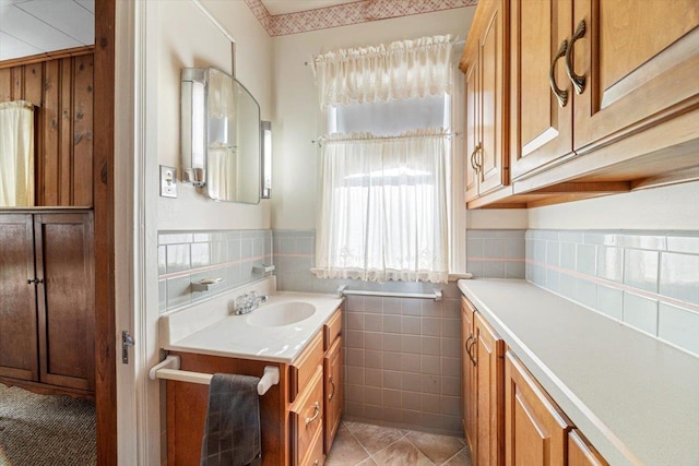 419 College Cir, Staunton, VA 24401 - bathroom with vanity, tile walls, wainscoting, and tile patterned floors