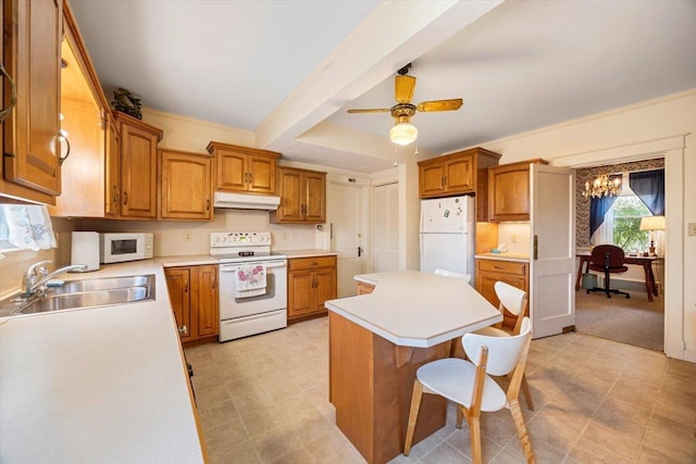 419 College Cir, Staunton, VA 24401 - kitchen featuring white appliances, under cabinet range hood, a sink, a center island, and brown cabinetry