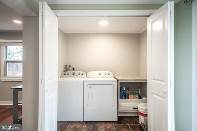 washroom with separate washer and dryer and recessed lighting