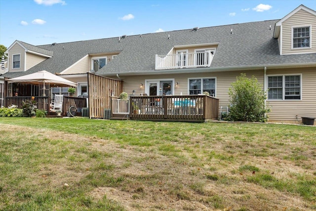 35 Hickory Nut Ln, Staunton, VA 24401 - back of property featuring a balcony, a shingled roof, a wooden deck, and a yard