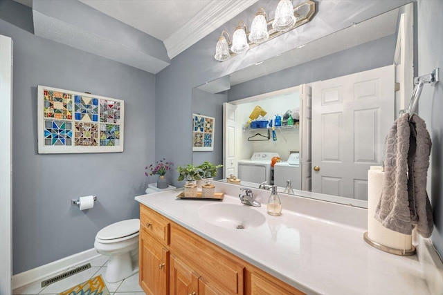 35 Hickory Nut Ln, Staunton, VA 24401 - bathroom with washer and clothes dryer, tile patterned floors, toilet, baseboards, and vanity
