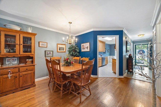 35 Hickory Nut Ln, Staunton, VA 24401 - dining space featuring light wood finished floors, a chandelier, baseboards, and ornamental molding