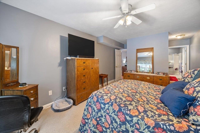 35 Hickory Nut Ln, Staunton, VA 24401 - bedroom featuring light colored carpet, baseboards, a ceiling fan, and connected bathroom