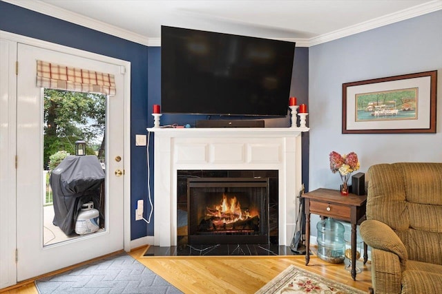 35 Hickory Nut Ln, Staunton, VA 24401 - living area with a tiled fireplace, wood finished floors, crown molding, and baseboards