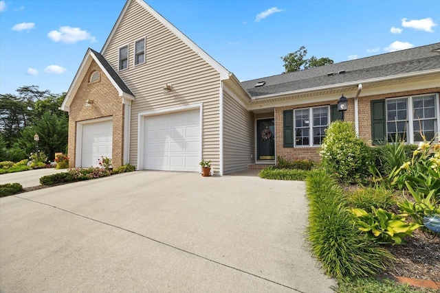35 Hickory Nut Ln, Staunton, VA 24401 - view of front of house with brick siding, driveway, and an attached garage