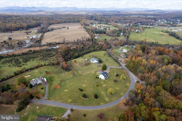 bird's eye view featuring a rural view and a mountain view