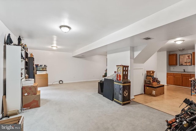  - finished basement featuring light carpet