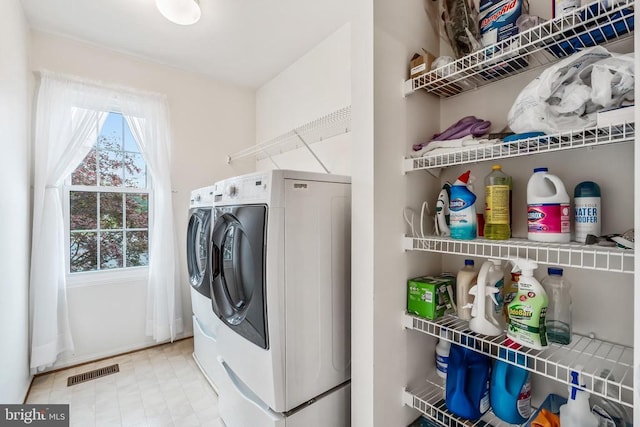  - laundry room featuring washer and dryer