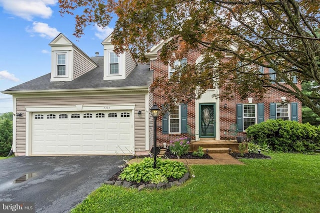  - view of front of home with asphalt driveway, a front yard, an attached garage, and a shingled roof