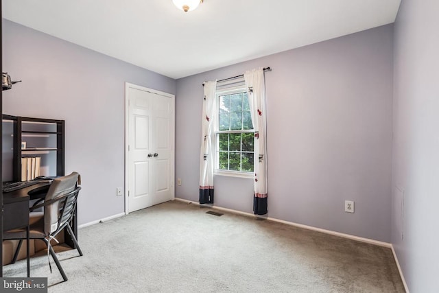  - carpeted home office with baseboards