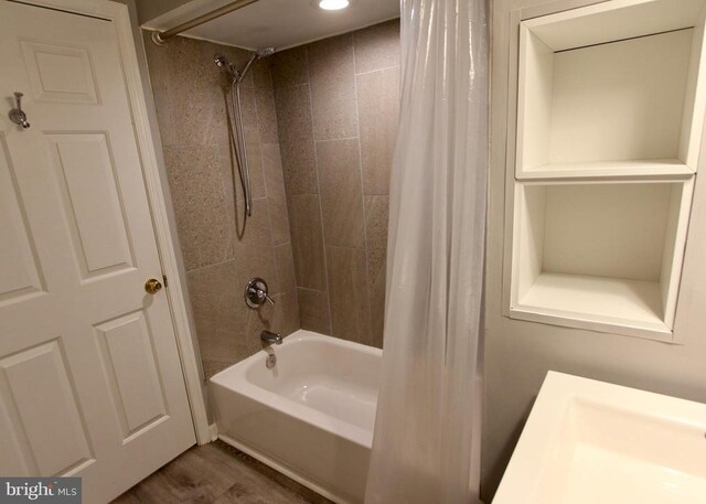 4605 Club Cart Cir, Fredericksburg, VA 22408 - full bathroom featuring shower / bath combo and wood finished floors