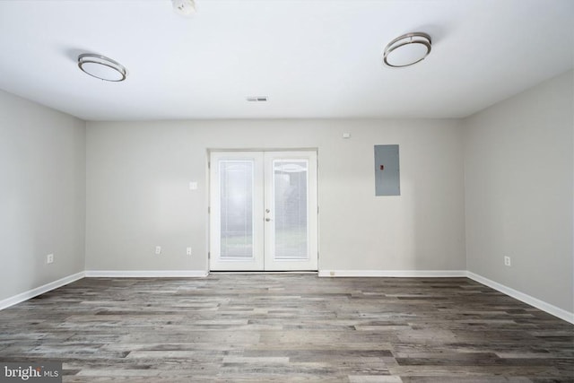 5122 Redbud Rd, Fredericksburg, VA 22407 - unfurnished room featuring electric panel, wood finished floors, french doors, and a smoke detector