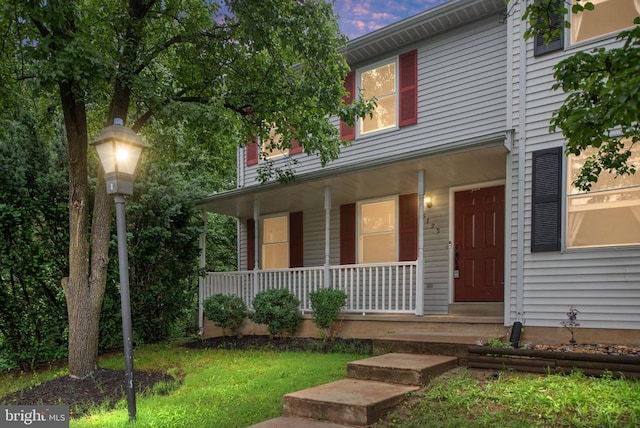 5122 Redbud Rd, Fredericksburg, VA 22407 - view of front facade with a porch