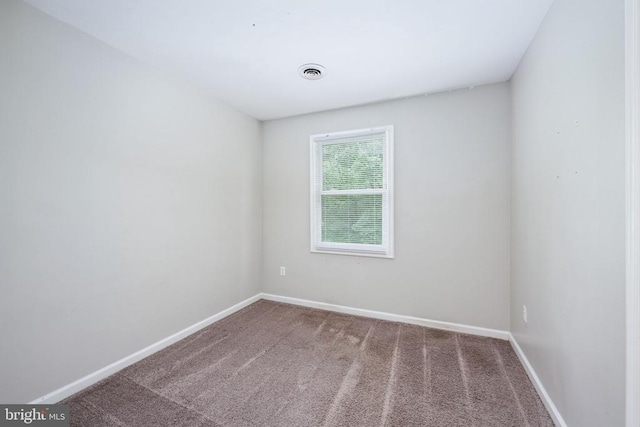 5122 Redbud Rd, Fredericksburg, VA 22407 - carpeted empty room with baseboards