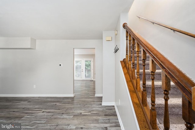 5122 Redbud Rd, Fredericksburg, VA 22407 - stairway featuring wood finished floors and baseboards