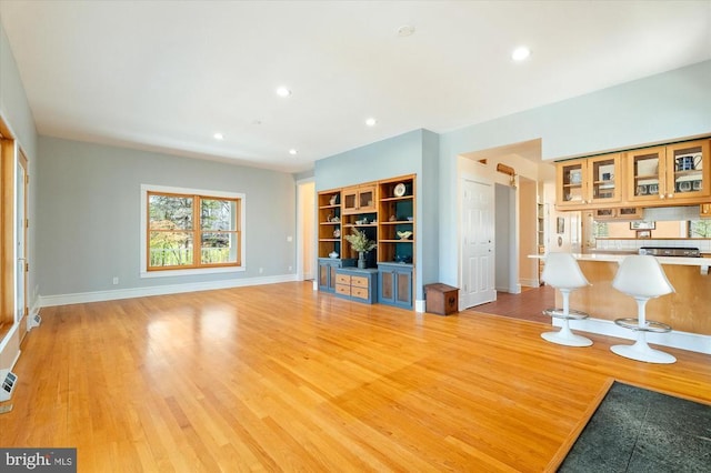 5864 Wyant Ln, Charlottesville, VA 22903 - living area with light wood-type flooring, baseboards, and recessed lighting