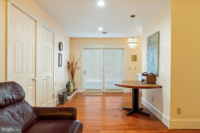 5864 Wyant Ln, Charlottesville, VA 22903 - living area with recessed lighting, wood finished floors, a chandelier, and baseboards