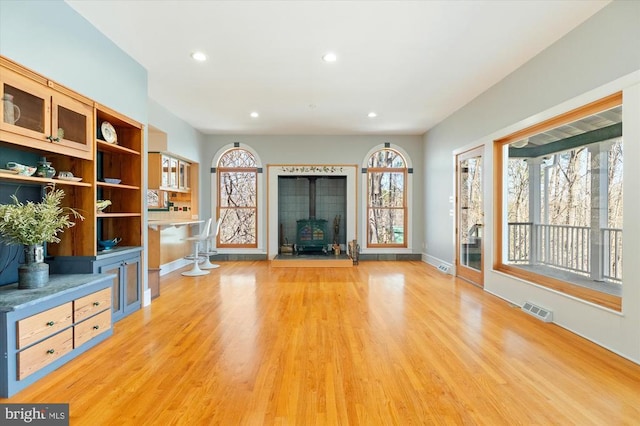 5864 Wyant Ln, Charlottesville, VA 22903 - unfurnished living room with light wood-style flooring, baseboards, and recessed lighting