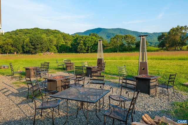 462 Winery Ln, Nellysford, VA 22958 - view of patio / terrace with a fire pit, a mountain view, and a rural view