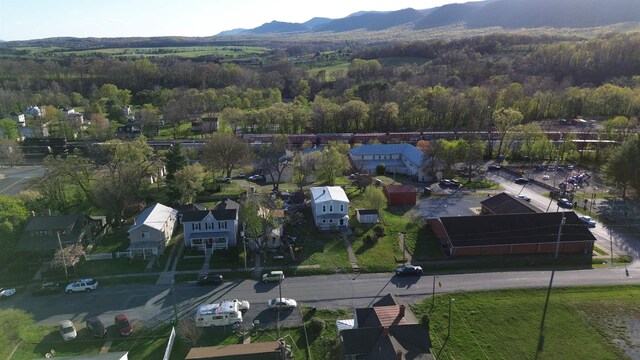 307 2nd St, Shenandoah, VA 22849 - aerial view of property's location featuring a mountainous background, a heavily wooded area, and nearby suburban area