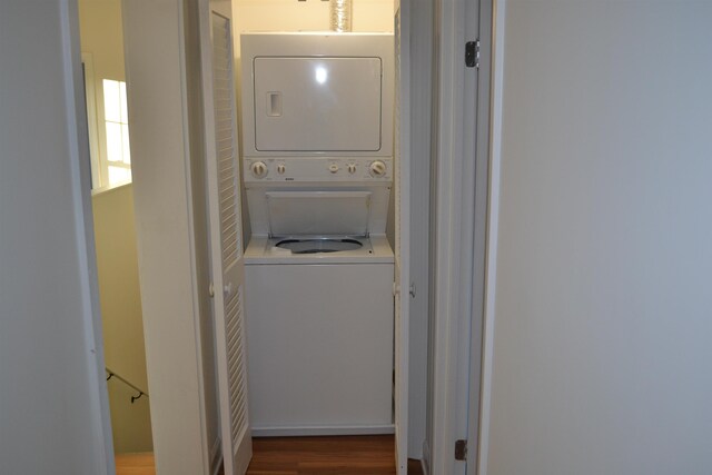 307 2nd St, Shenandoah, VA 22849 - clothes washing area with stacked washer / dryer and wood finished floors