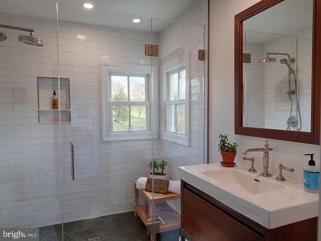 435 Larkins Mill Ln, Brightwood, VA 22715 - bathroom with a tile shower, tile patterned floors, vanity, and recessed lighting
