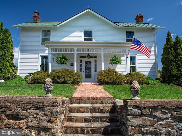 435 Larkins Mill Ln, Brightwood, VA 22715 - greek revival house with a chimney, metal roof, a standing seam roof, and covered porch