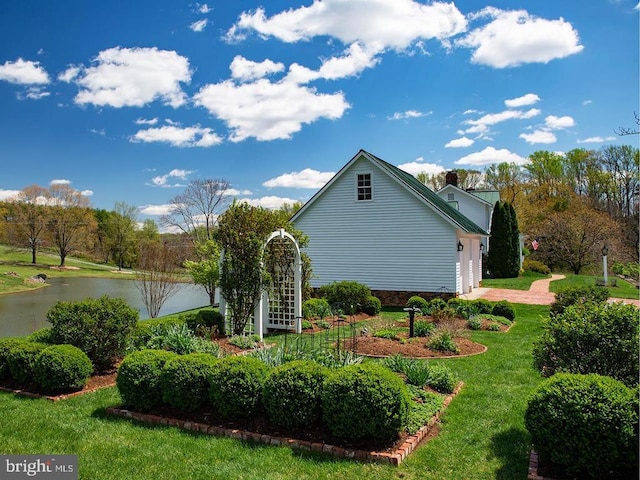 435 Larkins Mill Ln, Brightwood, VA 22715 - view of property exterior featuring a garage, a water view, and a lawn