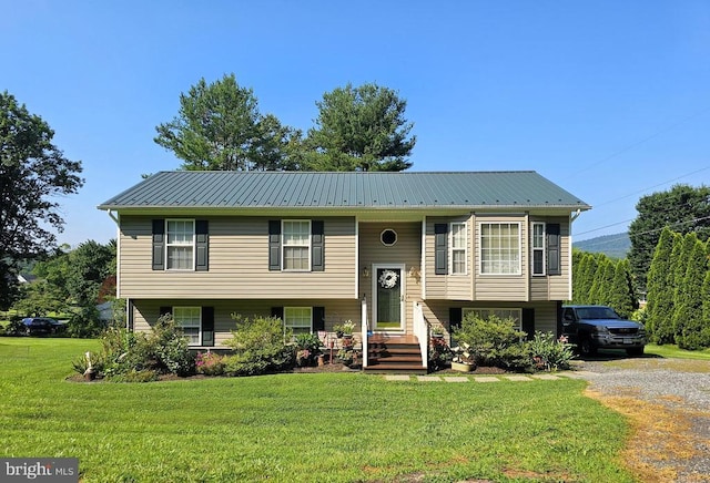 336 Blankenbaker Rd, Madison, VA 22727 - raised ranch featuring a front yard, a metal roof, and gravel driveway