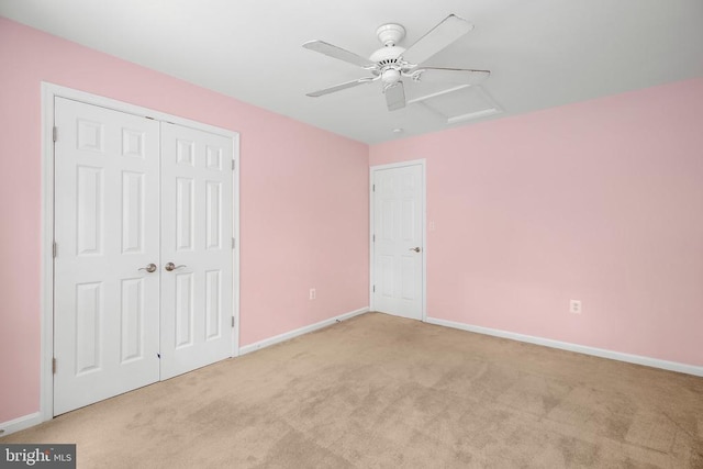 3113 Somerset Dr, Jeffersonton, VA 22724 - unfurnished bedroom with attic access, carpet, a closet, and a ceiling fan