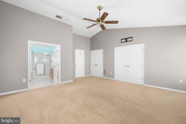3113 Somerset Dr, Jeffersonton, VA 22724 - unfurnished bedroom with high vaulted ceiling, multiple closets, light carpet, ensuite bathroom, and ceiling fan
